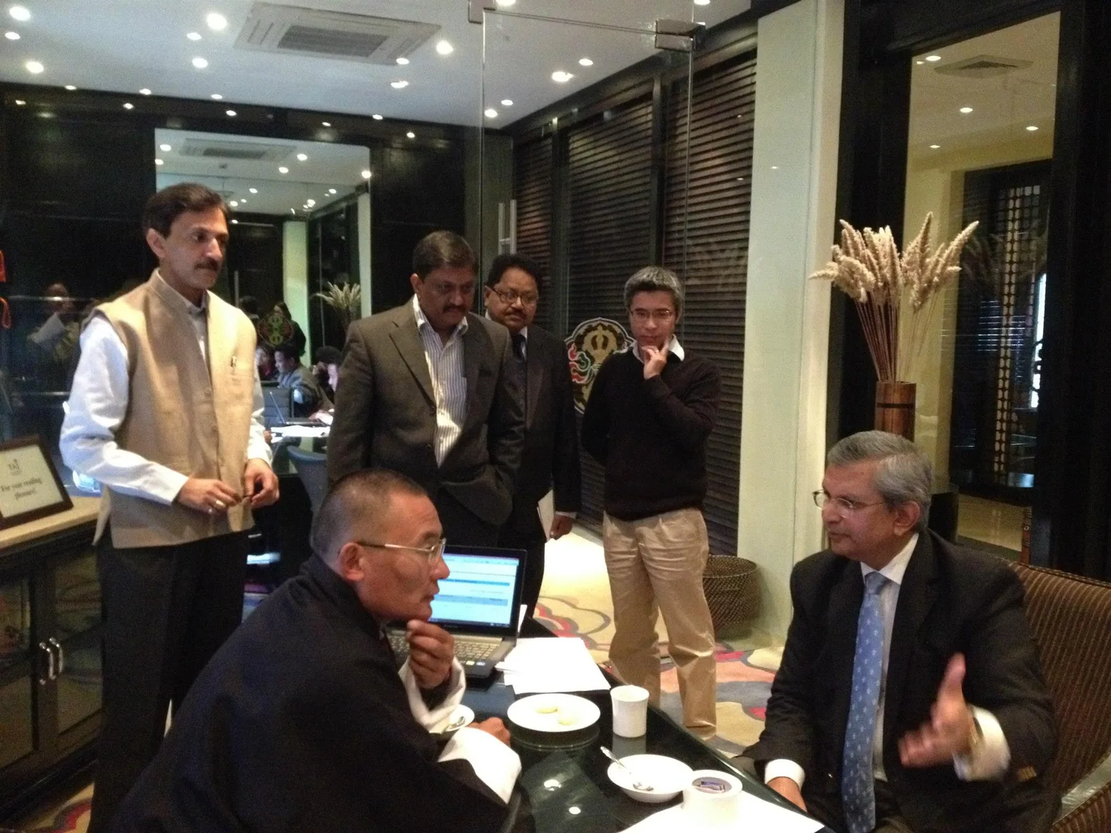 With the Prime Minister of Bhutan, Hon. Tshering Tobgay, discussing Performance Agreements
